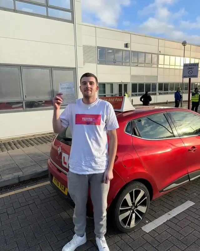 First-time pass celebration after driving lessons in Manchester with Cruise'N'Pass